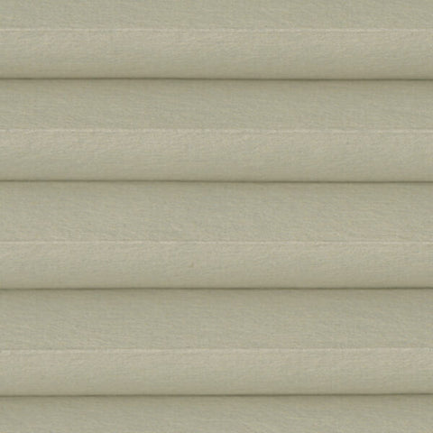 Astral Linen blackout cellular blind close up. Honeycomb cells for energy saving.