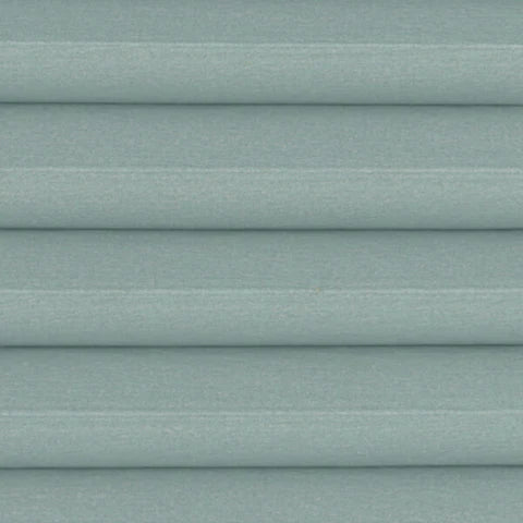 Mineral Green Astral Honeycomb Cellular blind with a Blackout design, showing a solid colour close up.