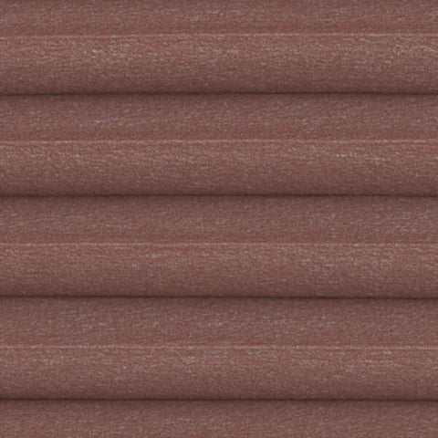 Red Astral Honeycomb Cellular blind with a Blackout design, showing a solid colour close up.