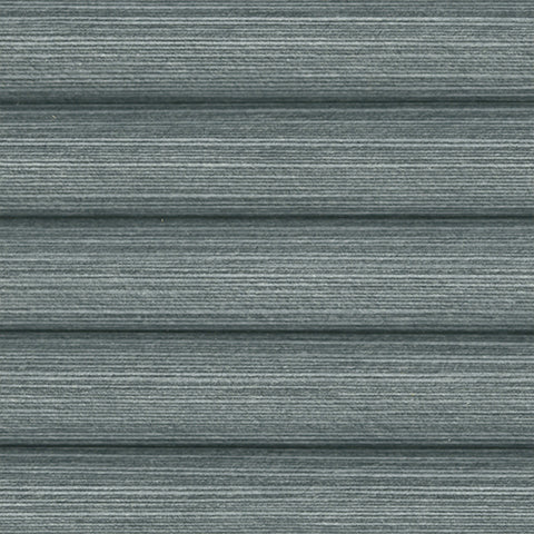 Close up of a Mirage Dark Anthracite Honeycomb Pleated Blind. Textured Blue pattern with horizontal line. Thermal and insulating cells.